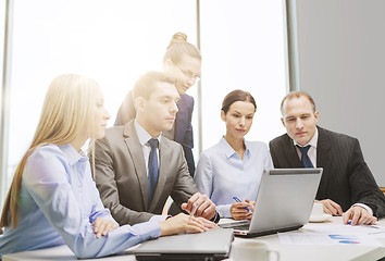 Image showing business team with laptop having discussion