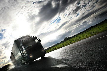 Image showing truck driving on country-road/motion