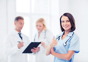 Image showing young female doctor with stethoscope