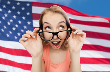 Image showing happy young woman or teenage girl in eyeglasses