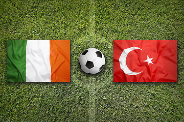 Image showing Ireland vs. Turkey flags on soccer field