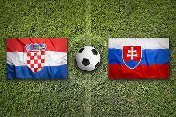 Image showing Croatia vs. Slovakia flags on soccer field