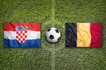Image showing Croatia vs. Belgium flags on soccer field