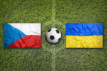 Image showing Czech Republic vs. Ukraine flags on soccer field