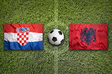 Image showing Croatia vs. Albania flags on soccer field