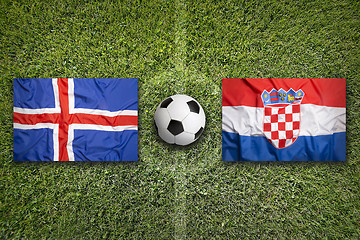 Image showing Iceland vs. Croatia flags on soccer field