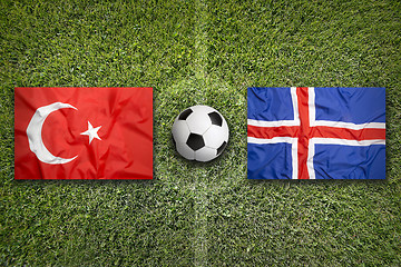 Image showing Turkey vs. Iceland flags on soccer field
