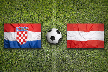 Image showing Croatia vs. Austria flags on soccer field