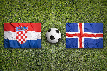 Image showing Croatia vs. Iceland flags on soccer field