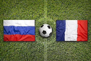 Image showing Russia vs. France flags on soccer field