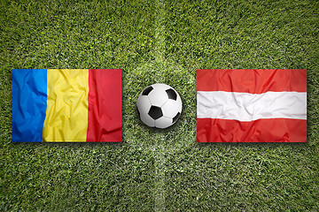 Image showing Romania vs. Austria flags on soccer field