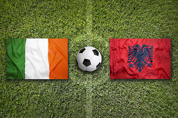Image showing Ireland vs. Albania flags on soccer field
