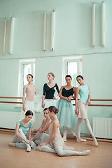 Image showing The seven ballerinas at ballet bar