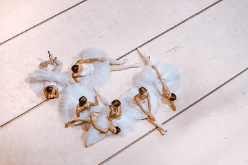 Image showing The seven ballerinas on floor