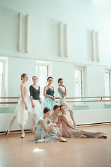 Image showing The seven ballerinas at ballet bar