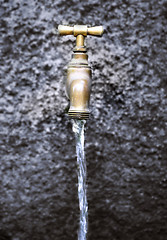 Image showing Water running from outdoor tap