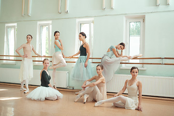 Image showing The seven ballerinas at ballet bar