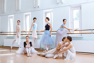 Image showing The seven ballerinas at ballet bar