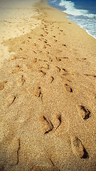 Image showing Footsteps on the beach by the sea