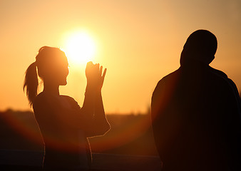 Image showing Couple watching sunset