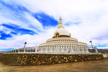 Image showing Shanti Stupa on a background cloudy sky