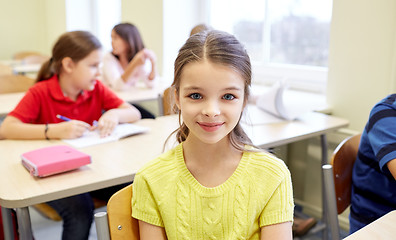 Image showing student girl with group of school kids in class