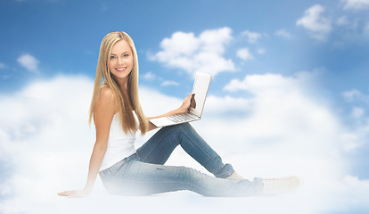 Image showing young woman sitting with laptop