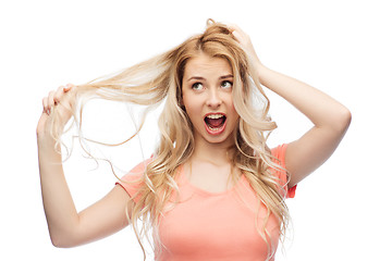 Image showing woman holding strand of her hair