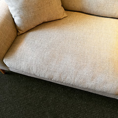 Image showing Simple beige sofa with cushion