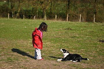 Image showing Child and dog