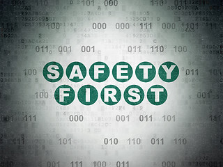 Image showing Safety concept: Safety First on Digital Data Paper background