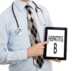 Image showing Doctor holding tablet - Hepatitis B