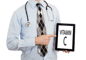 Image showing Doctor holding tablet - Vitamin C