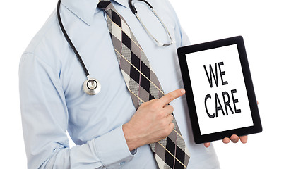 Image showing Doctor holding tablet - We care