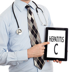 Image showing Doctor holding tablet - Hepatitis C