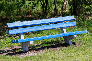 Image showing Blue bench in a public park