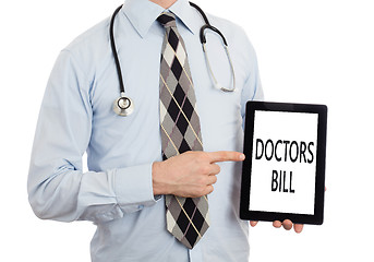 Image showing Doctor holding tablet - Doctors bill