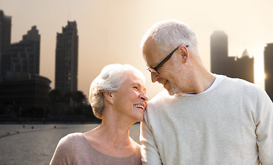 Image showing senior couple over dubai city street background