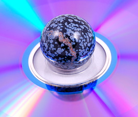 Image showing Painted ball on a rainbow surface