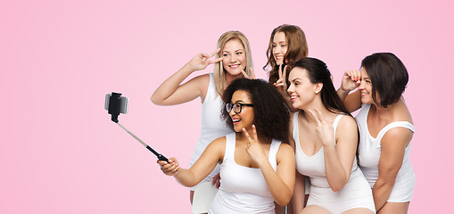 Image showing group of happy women taking selfie by smartphoone