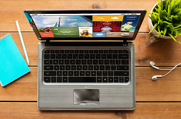 Image showing close up of laptop computer with internet news