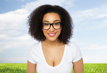 Image showing happy african woman or student girl in eyeglasses