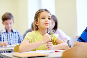 Image showing student girl with group of school kids in class