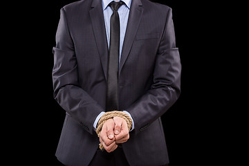 Image showing Businessmen tied hand