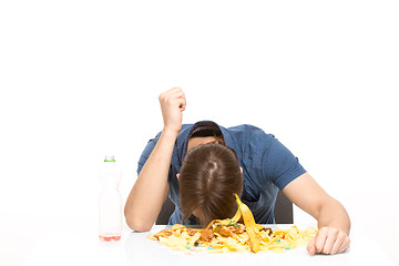 Image showing man buried his face in the trash. isolated on white background