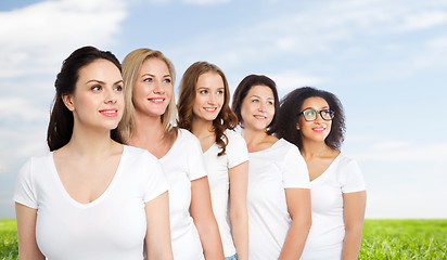 Image showing group of happy different women in white t-shirts