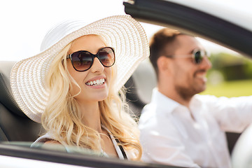 Image showing happy man and woman driving in cabriolet car