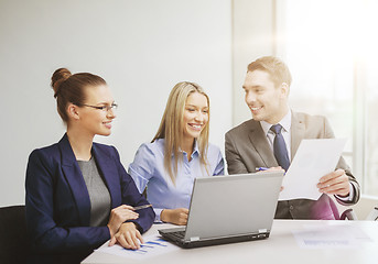 Image showing business team with laptop having discussion