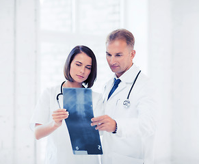 Image showing two doctors looking at x-ray