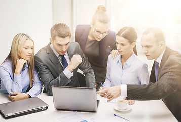 Image showing business team with laptop having discussion